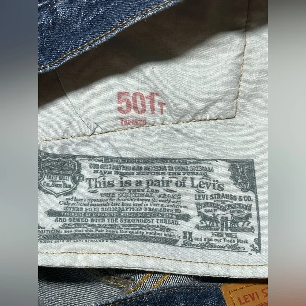 Levi’s 501 T tapered fit distressed button fly denim jeans style 40197 size 28